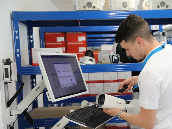 Arclap technician preparing a camera